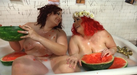 Before their male subs eat their scores, Obese females consume melons in a tub.