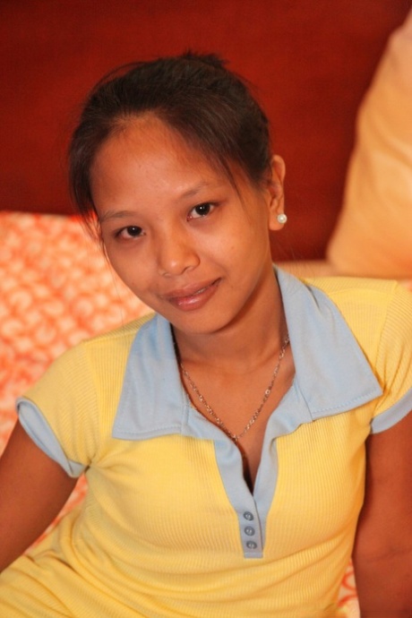 Exhibiting her delicious pussy and tiny tits, sweet Filipina Danica goes naked for the first time.