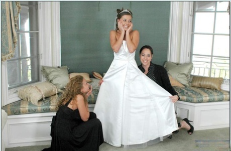 Sexy bride & her maid of honor engage in sleazy wedding night threesome