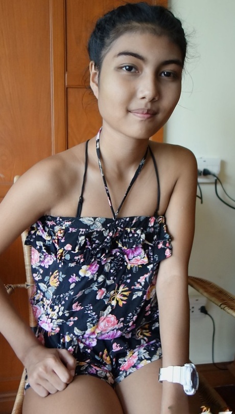 Petite Asian Teen Pauw Takes Off Her Gown And Flaunts Her Tits And Hairy Kitty