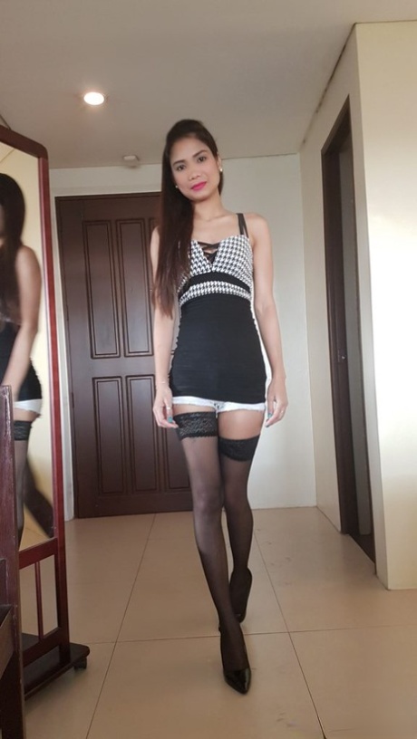 Guy Jerks Off Looking At Skinny Filipina In Stockings And Cums On Her Face