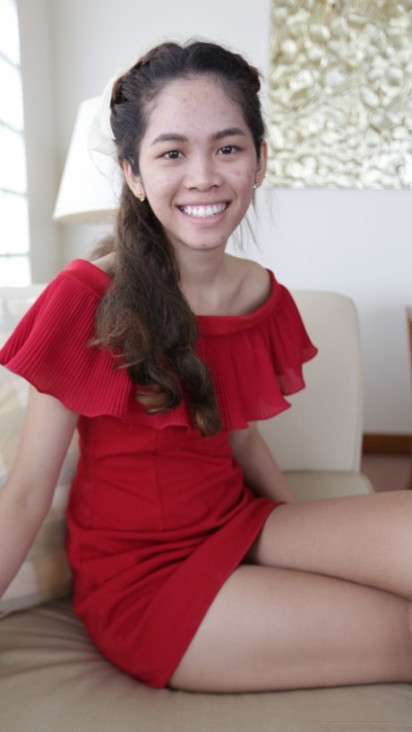 Cute First Timer From Thailand Poses In Her Red Dress Prior To Modeling Gig