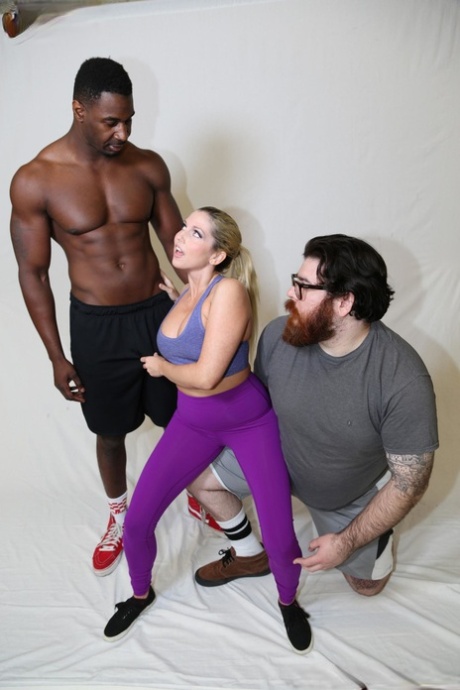 With her cuckold in tow, Christie Stevens seduces a BBC during a workout session at the gym.