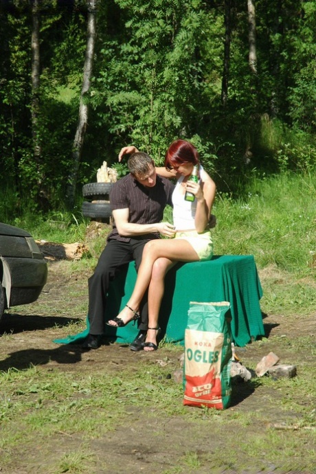 Teen With Red Hair Diana Bends Over A Green Table And Gets Rammed Outdoors