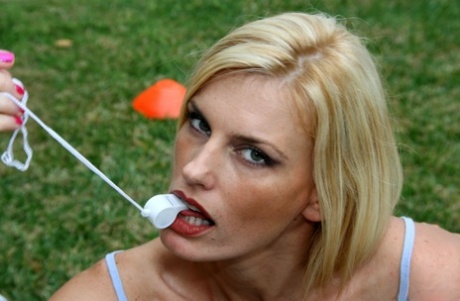 With her medium tits and blowjobs, Darryl Hanah, the mature blonde, performs oral coralus on her soccer coach.