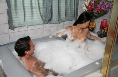 A jagged Jacuzzi hand massage is performed on Tia Ling, a slim-but-strong Asian woman, before her body can be smoothed.