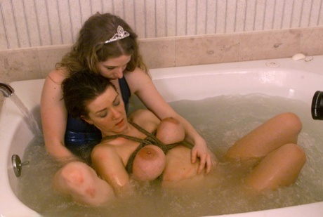 The water bondage was performed on Princess Kali and Alisha Angel.