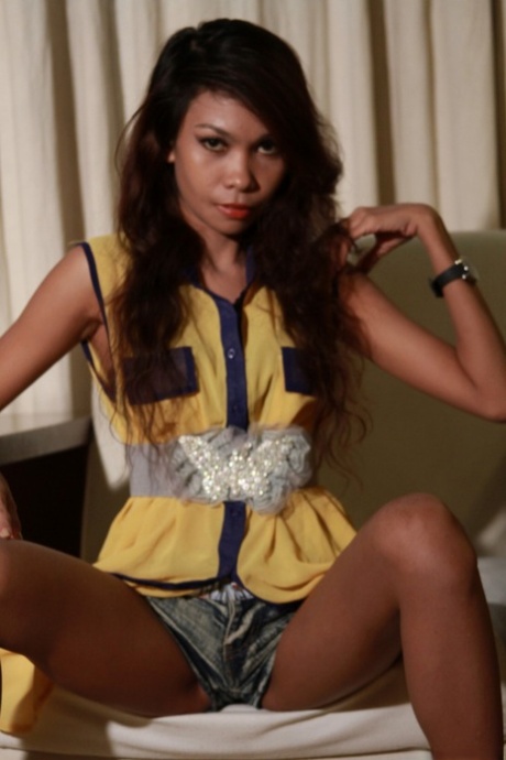 Pretty Filipina Fani displays her slim physique while donning provocative attire.