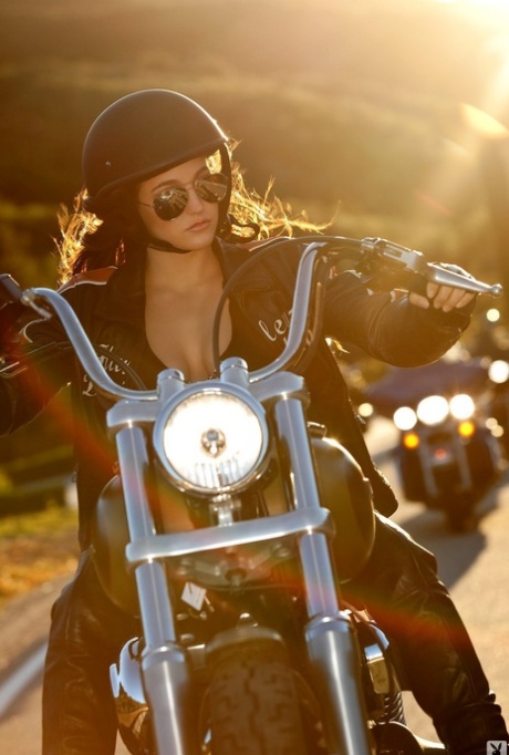 Remarkable brunette centerfold Jaclyn Swedberg poses topless on a motorcycle #2
