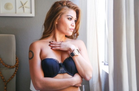 In a hotel room, Filipina MILF Charmane Star is seen looking stunning in her lingerie.