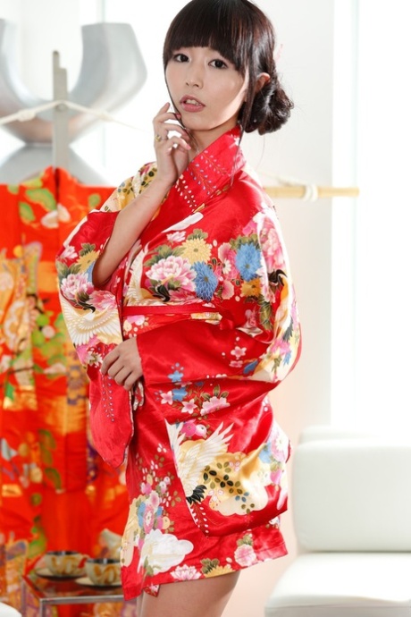 Japanese woman Marica Hase, wearing a brunette style after she took off her kimono.