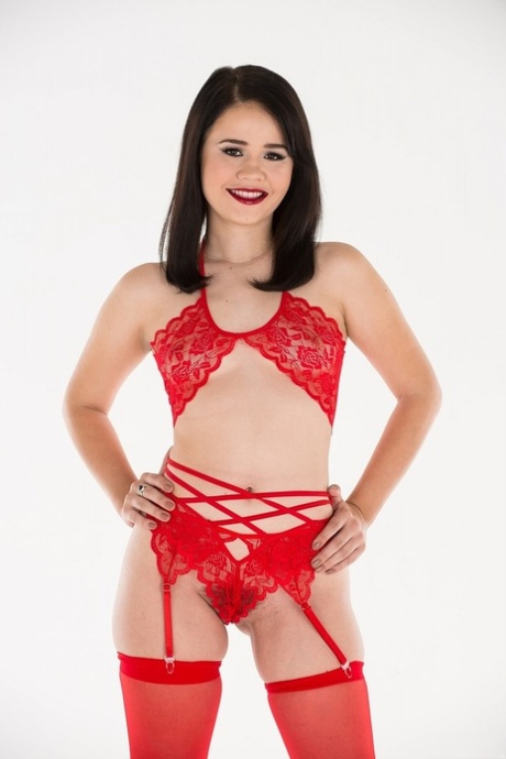 In her daring outfit of red undies and Yhivi's flashing bum, she looks like an impressive brunette with a well-manicured pussy.