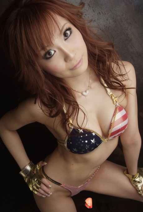 Misa Kikouden, a charming Asian brunette, is seen wearing her stunning natural tits.
