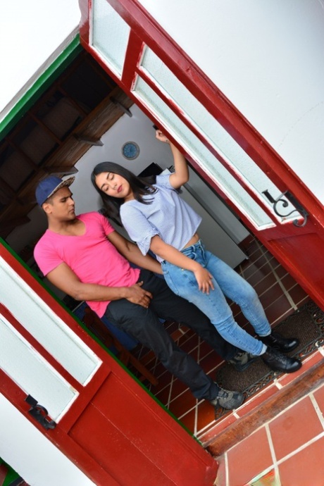 An 18-year-old Latina impresses a man wearing tight blue jeans.