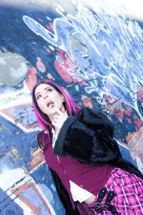 Sexy schoolgirl Joanna Angel smoking hot while spreading ass in an alleyway