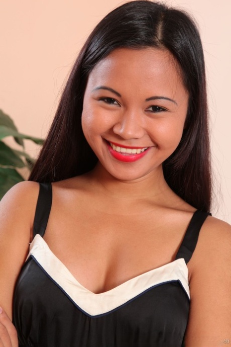 Teen Asian Jasmin reveals her cute titties while doffing her black dress