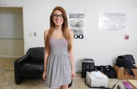 Cute teen with glasses Joseline Kelly poses naked solo action and shows tits