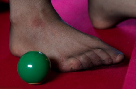 Following a couple of drinks, Siri the blonde engages in foot worship with a man.