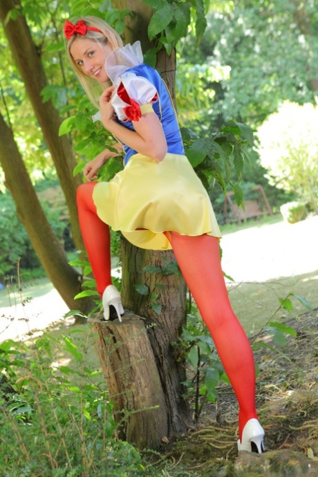 Sweet Girl In Snow White Costume Nikki F Poses Topless In Red Nylons Outdoors
