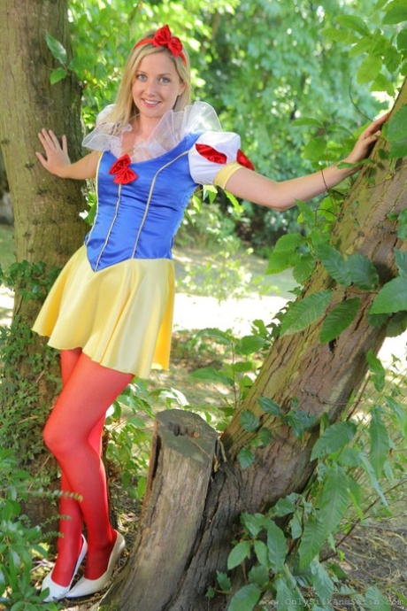 Sweet Girl In Snow White Costume Nikki F Poses Topless In Red Nylons Outdoors