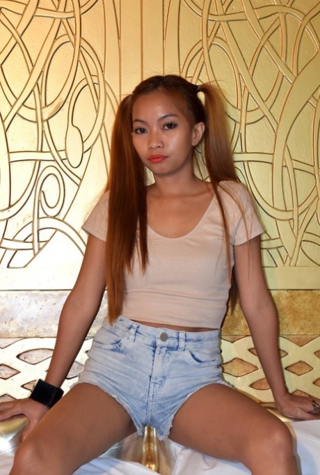 Cute Filipina teen Mikaela strips and reveals her perky nipples