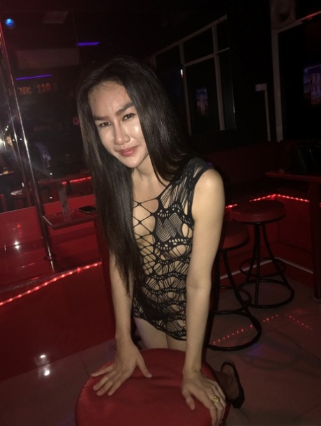 Various amateur ladyboys with seductive breast sizes are captured in candid club shots, flaunting their feminine curves.