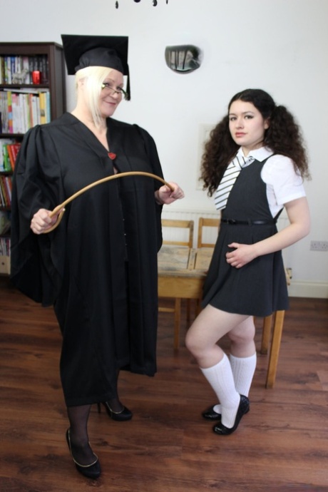 Chubby GILF Lacey Starr takes pleasure in sexual activity with Tomoko, a curly haired student.