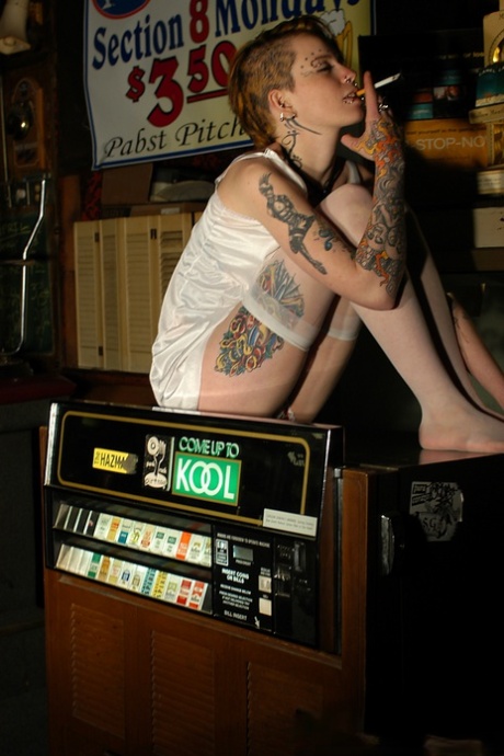 Babe With Short Hair And Heavy Tattoos Is A Striptease At An Empty Bar