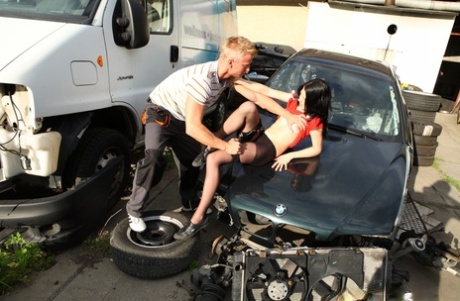 Petite brunette teen Olga gets fucked on the car hood & facialed by a mechanic
