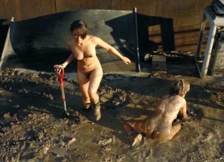 The mud presents a 2 against 1 naked lezdom session for blonde MILF Tyla Wynn.