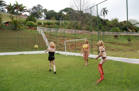 Horny Shemales Unveil Their Big Booties And Fuck Each Other On A Soccer Field