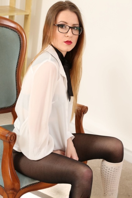 Scarlot Rose, the brunette nerd, plays and teases herself wearing pantyhose.