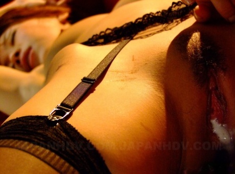 Asian-sex slave Runa Sesaki is rammed and creampied in a garter belt.