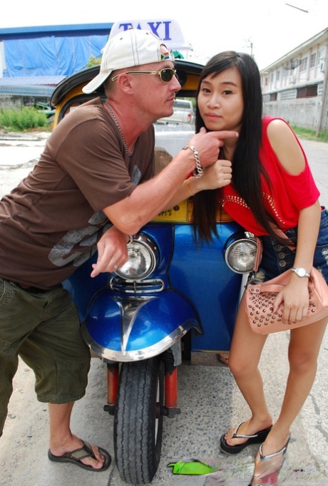 Lovely Asian teen in sexy jean shorts gets picked up on the street