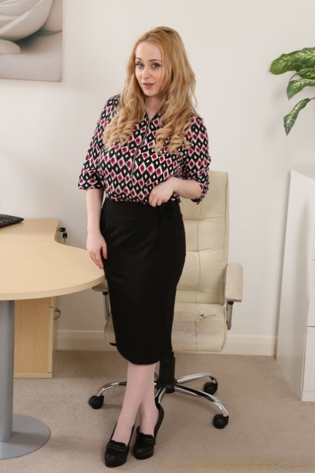 Secretary Emma Rachael wearing pantyhose while dressed in topless attire for her office.