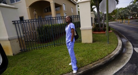 Lexxi Deep, a health care girl from Ebony, is seen driving a white knob in a van with other passengers.