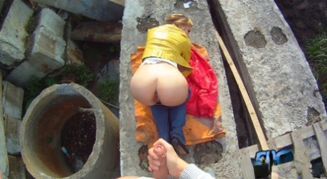 An 18-year-old girl named Emma experiences a sexual experience where she performs oral musing and doggystyle in front of her partner at a construction site.