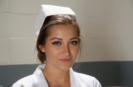 Gorgeous Nurse With A Nice Butt Dani Daniels Strips And Poses In High Heels