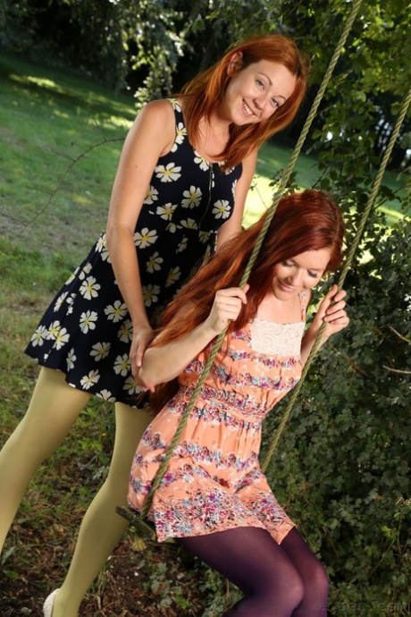 Skinny Redheads Mia S And Elen E Pose In Pantyhose On An Outdoor Swing