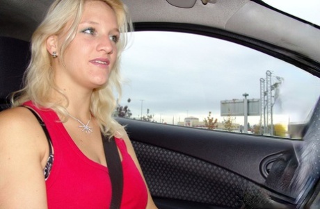 With her big tits and blonde hair, Sweety B performs cunnilingus in the back of a car.