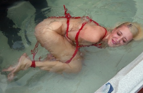 Bondage in water: Kimberly Kane.