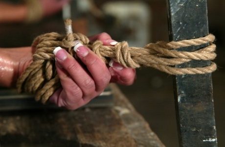 Sexy brunette Jasmine Byrne is seen having her shaved buttocks done in bondage.