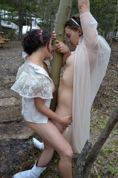 Sacred forest: Sage and Simona cuddle with each other like they are all natural girls.