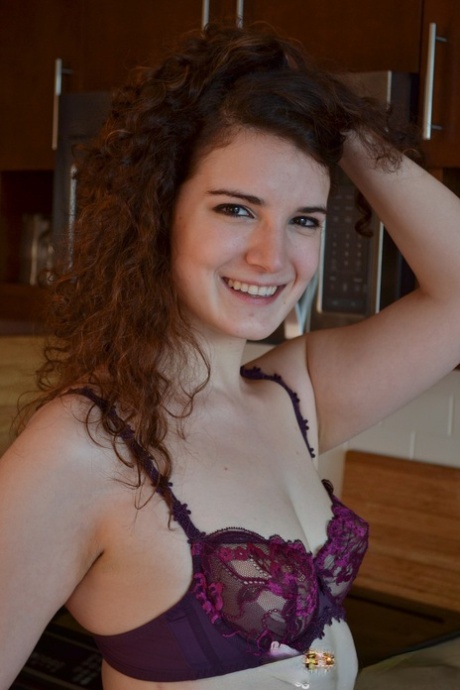 Sweet curly haired teen Endza reveals her sexy ass & black lingerie in ktichen