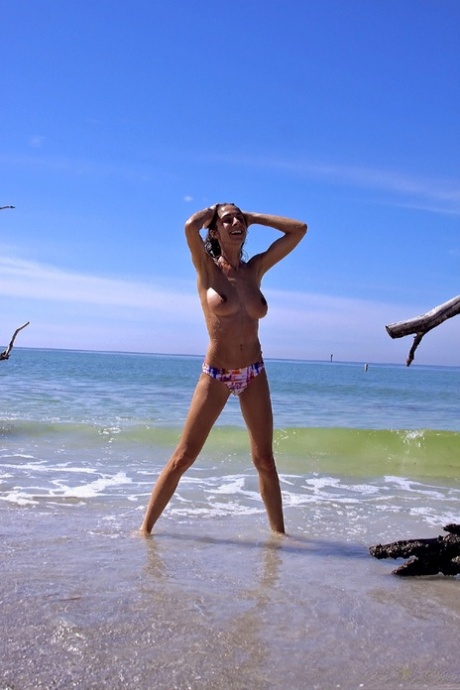 Teen With Beautiful Tits Michelle Enjoying Naked Water Play On The Beach