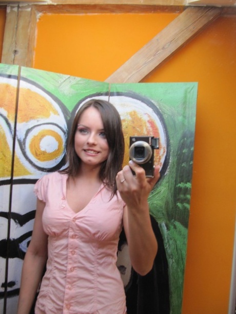 Brunette amateur teen Kari takes hot selfies in the mirror after stripping