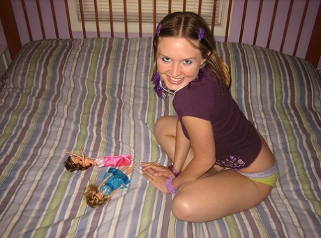 Cute Brunette Kitty Strips And Toys Herself After Playing With Barbies