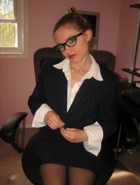 The charming miLF Kitty bares her private parts and removes them.