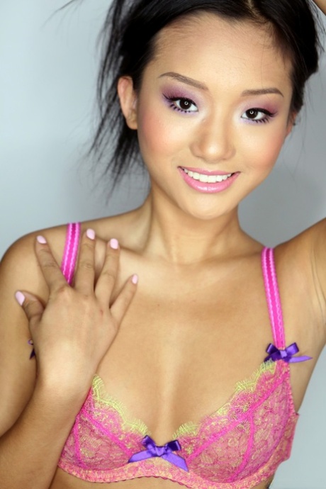 Petite Asian Alina Li Poses Erotically In Pink Lace Lingerie & Teases Topless