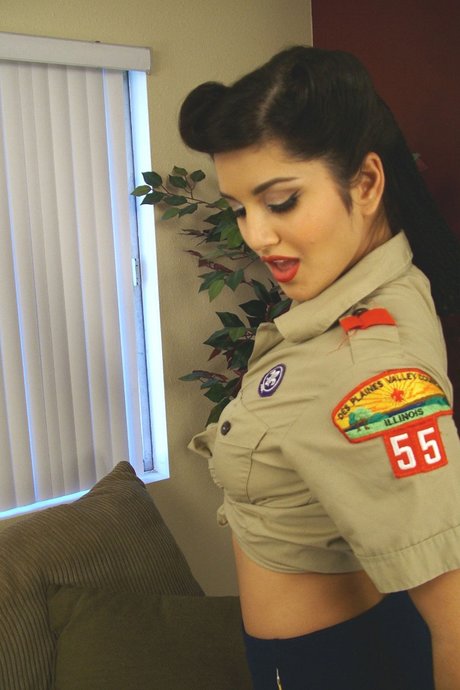 Indian MILF Sunny Leone Teasing In Red Boots & A Slutty Scouting Outfit